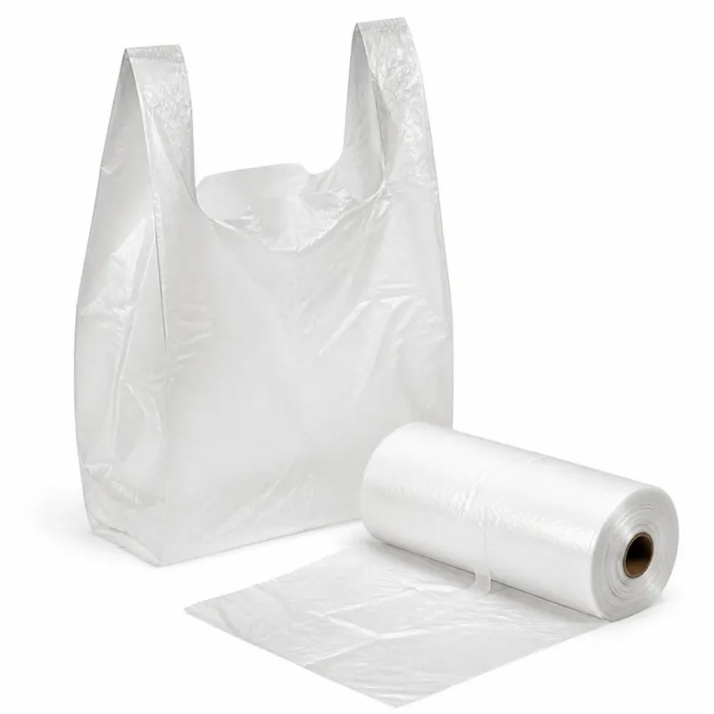 Thin white HDPE vest bag beside a roll of clear HDPE bags